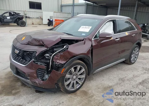 2022 Cadillac Xt4 Fwd Premium Luxury from USA, damaged, VIN 1GYFZCR4XNF116845